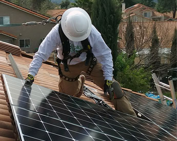Man Installing Solar Panels